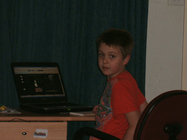 Image of me using the family computer as a child